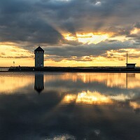 Buy canvas prints of Sunset colours and reflections over Brightlingsea tidal pool  by Tony lopez
