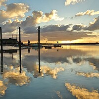 Buy canvas prints of Harbour skyscape reflections over Brightlingsea Harbour  by Tony lopez
