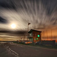 Buy canvas prints of moon glow cloudscape over the Brightlingsea promen by Tony lopez