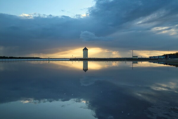 Sunset cloudscape colours and reflections over Brightlingsea tidal pool  Picture Board by Tony lopez