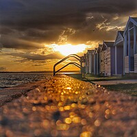 Buy canvas prints of Sunsetting after the storm over Brightlingsea beach  by Tony lopez