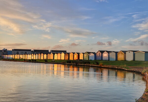 Sunrise reflections across the Brightlingsea Boating lake  Picture Board by Tony lopez