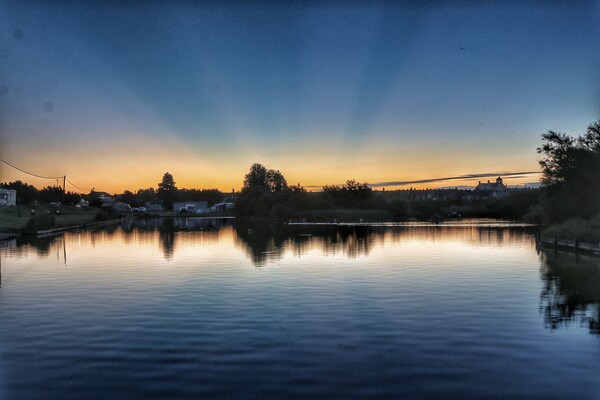 Sun  rising over the Boating lake in Brightlingsea Picture Board by Tony lopez