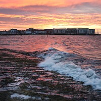 Buy canvas prints of Sunrise colours over the Brightlingsea promenade  by Tony lopez