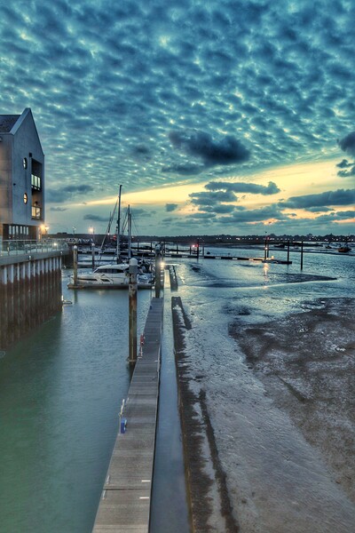 Glorious cloudscape colours over the Brightlingsea Harbour in Essex  Picture Board by Tony lopez