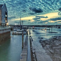 Buy canvas prints of Glorious cloudscape colours over the Brightlingsea Harbour in Essex  by Tony lopez
