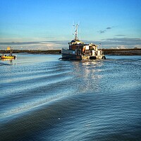 Buy canvas prints of Comming home in the afternoon sun into Brightlingsea Harbour.  by Tony lopez