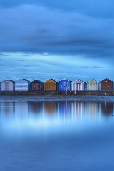 Early morning blue over Brightlingsea beach huts  Picture Board by Tony lopez