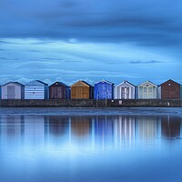 Buy canvas prints of Early morning blue over Brightlingsea beach huts  by Tony lopez