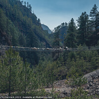 Buy canvas prints of Rope Bridge across the valley by Matthew McCormack