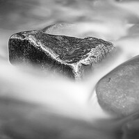Buy canvas prints of Rock Surrounded by Flowing Water by Kevin Howchin