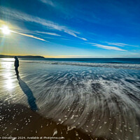 Buy canvas prints of A Solo Walker on Woolacombe Beach. by Ian Donaldson