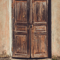 Buy canvas prints of Old shabby faded wooden doors  by Lana Topoleva