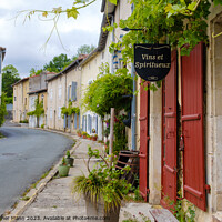 Buy canvas prints of Street view in Verteuil-sur-Charente, Charente, Poitou-Charente, France by Chris Mann