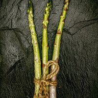 Buy canvas prints of Asparagus Stalks on Slate by Peter Paterson