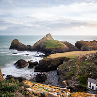 Buy canvas prints of Cornwalls Dramatic and Isolated Kynance Cove by Matthew Grey