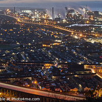 Buy canvas prints of Port Talbot and Steel Works at night with the trails of car lights on the M4 motorway by Terry Brooks