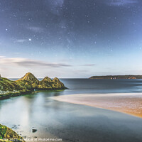 Buy canvas prints of Star Trails over Three Cliffs Bay, Gower, South Wales by Terry Brooks