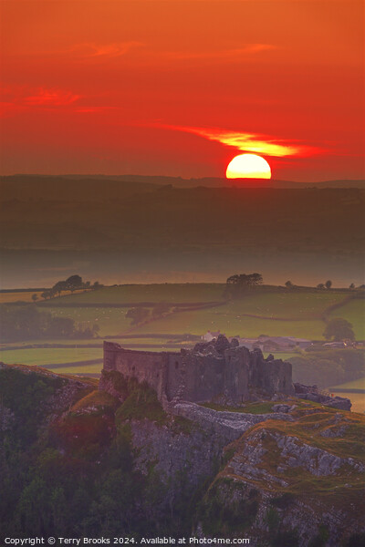 Sunset over Carreg Cennen Castle Picture Board by Terry Brooks