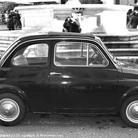 Buy canvas prints of Vintage FIAT 500 on Rome street in black and white by Stefano Senise
