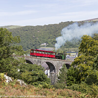 Buy canvas prints of Steam Train on The Snowdon Mountain Railway leavin by Andy Critchfield