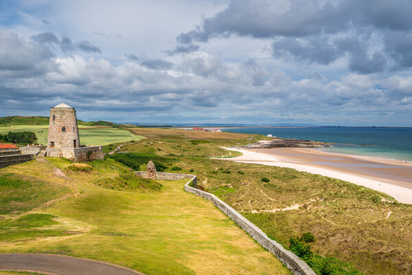 View from Bamburgh Castle Overlooking Northumberland's Coastal Beauty Picture Board by Paul Grubb