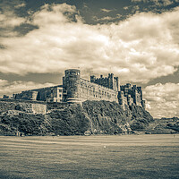 Buy canvas prints of Bamburgh Castle (Black and White) by Paul Grubb