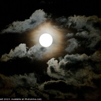 Buy canvas prints of Dark super moon surrounded by clouds by Helen Reid