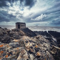 Buy canvas prints of Ruin on a rocky coast by Chris Spalton