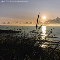 Buy canvas prints of Warm Sunrise at Potters Resort, Hopton-on-Sea by Rebecca Abbott