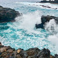 Buy canvas prints of Large waves crash against the volcanic rock in La Palma by Madeleine Deaton