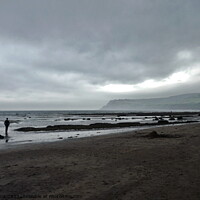 Buy canvas prints of Beach with storm clouds, Robin Hood’s Bay by Paul Boizot