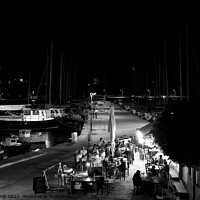 Buy canvas prints of Lipsi evening boats and ouzerie, monochrome by Paul Boizot
