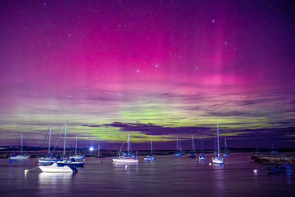 Northern lights, Norfolk Picture Board by Bryn Ditheridge