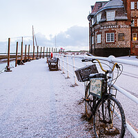Buy canvas prints of Snowy bicycle  by Bryn Ditheridge