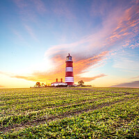 Buy canvas prints of Happisburgh Lighthouse Sunrise by Bryn Ditheridge