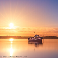 Buy canvas prints of Lone boat at sunset by Rob Greenwood