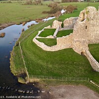 Buy canvas prints of Ogmore castle and stepping stones  by Jonny Angle