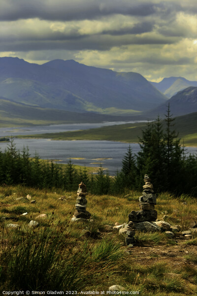Stone Stacks at The 5 Sisters of Kintail Picture Board by Simon Gladwin