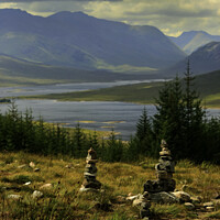 Buy canvas prints of Stone Stacks at The 5 Sisters of Kintail by Simon Gladwin