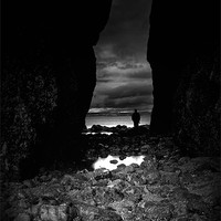 Buy canvas prints of Lydstep cavern,Tenby in Black and White by Simon Gladwin
