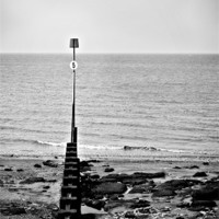 Buy canvas prints of Groyne Number 5, Hunstanton in Black and White by Simon Gladwin