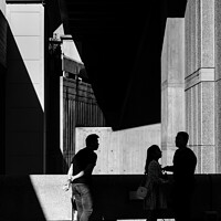 Buy canvas prints of Shadows with three figures by Mark Phillips
