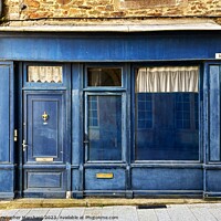 Buy canvas prints of A blue French house front  by Christopher Marchant