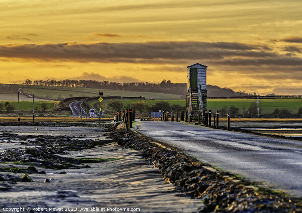 The Lindisfarne Causeway at dusk Picture Board by Robert Mowat