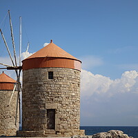Buy canvas prints of Windmills at the seafront in the city of Rhodes in Rhodes island in Greece by Virginija Vaidakaviciene