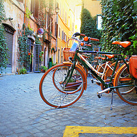 Buy canvas prints of Bicycle standing in front of store on old street of Rome . by Virginija Vaidakaviciene