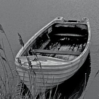 Buy canvas prints of Isolated wooden Rowing Boat by James Allen