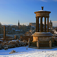 Buy canvas prints of Snow on Calton Hill and city of Edinburgh, Scotlan by Arch White