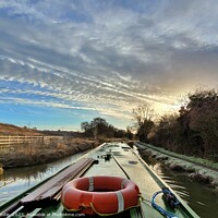 Buy canvas prints of Narrowboat Travelling Down A Wintery Oxford Canal  by Sandie 